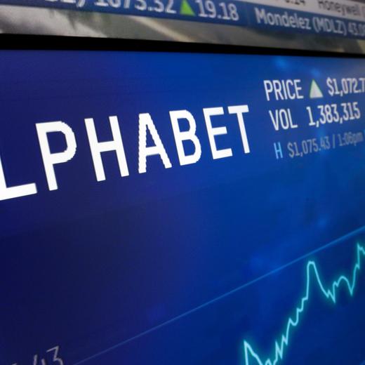 FILE - In this Feb. 14, 2018, file photo the logo for Alphabet appears on a screen at the Nasdaq MarketSite in New York. Alphabet reports earnings on Tuesday July 25, 2023. (AP Photo/Richard Drew, File)  Alphabet