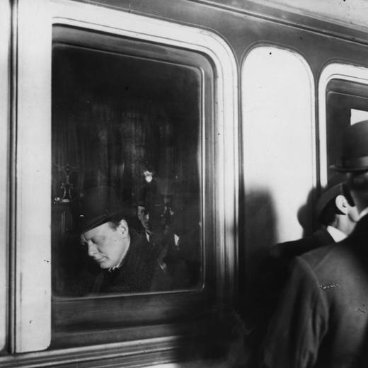 1912: Winston Leonard Spencer Churchill (1874 - 1965), British Statesman and Prime Minister on his way to Belfast seen reading over his speach. (Photo by Hulton Archive/Getty Images)