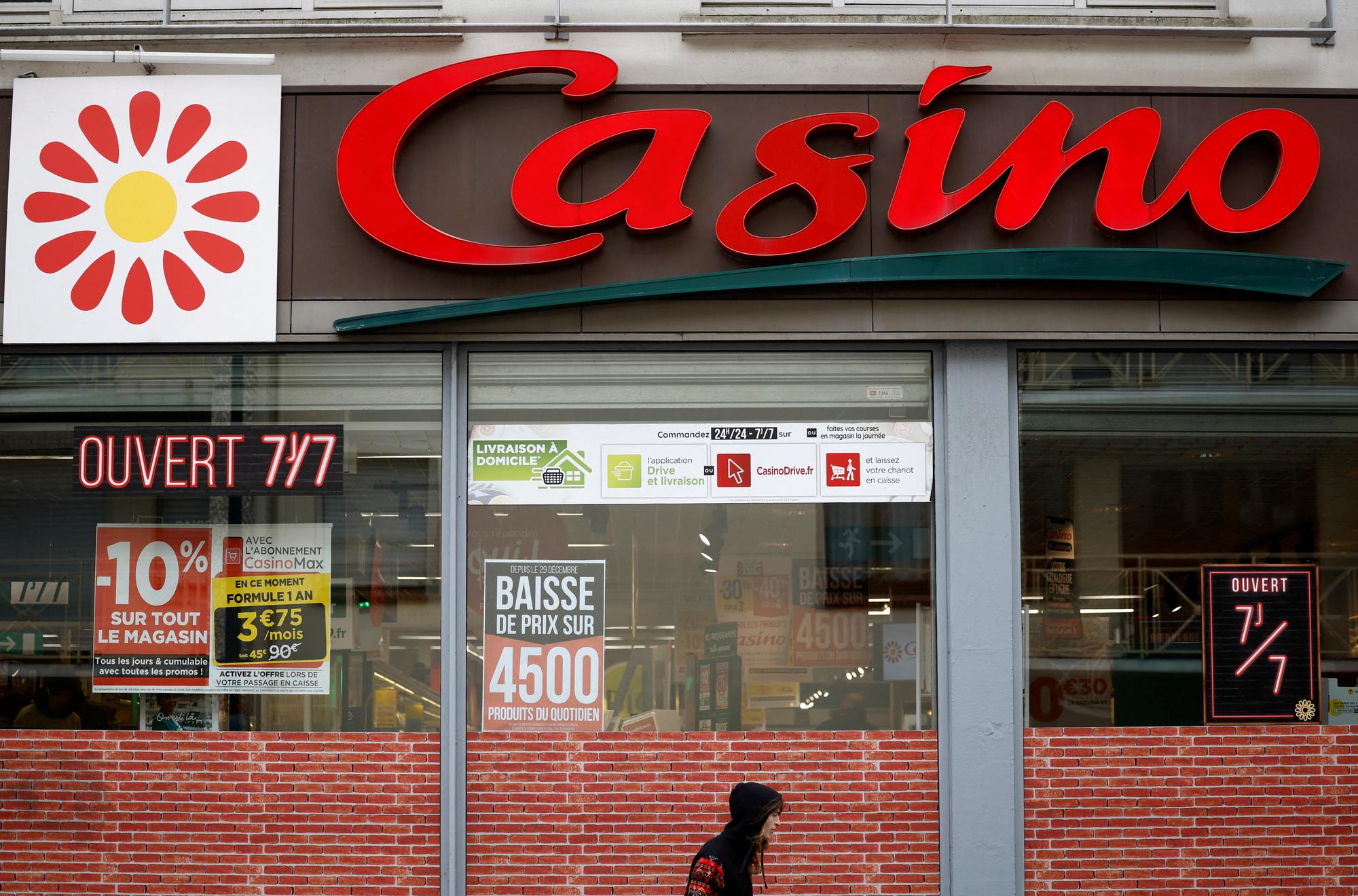 FILE PHOTO: A logo of French retailer Casino is pictured outside a Casino supermarket in Nantes, France, February 2, 2023. REUTERS/Stephane Mahe/File Photo