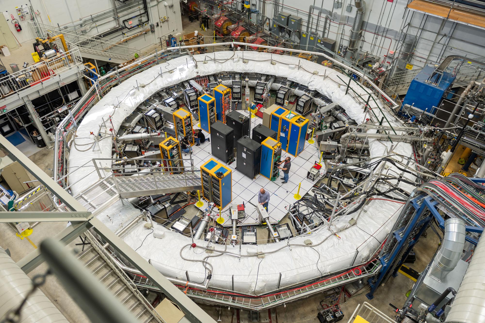 The Muon g-2 ring sits in its detector hall at U.S. Department of Energy's Fermi National Accelerator Laboratory (Fermilab) in Batavia, Illinois, U.S., in an undated handout photo. An experiment studied the wobble of subatomic particles called muons as they traveled through a magnetic field. Fermi National Accelerator Laboratory/Ryan Postel/Handout via REUTERS THIS IMAGE HAS BEEN SUPPLIED BY A THIRD PARTY