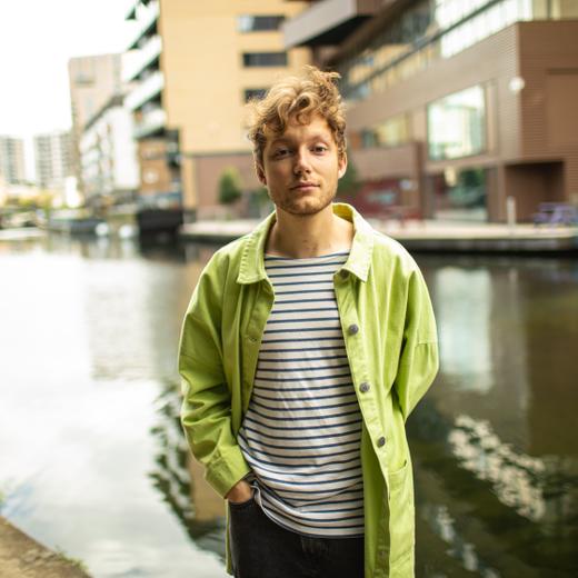 Gaspar Narby, musician, photographed along the Grand Union Canal in Central London. Gaspar Narby is a 26 year-old Swiss multi-instrumentalist, songwriter and producer based in London who released his debut single Home in Summer of 2017. Inspired by Bonobo, Sufjan Stevens, and Massive Attack, he fuses downtempo melancholia, pop dazzle, and singer-songwriter spirit with lush arrangements and electronic textures. Gaspar Narby studied Popular music at Goldsmith University in London. He caught the eye of Mixmag (New Artists of January 2020, print edition), Complex, Wonderland Magazine, IndieShuffle, Earmilk and AcidStag among others, with his music being featured on playlists such as New Music Friday UK, The Other List, Our Generation, Indie Garden and Your Office Stereo.