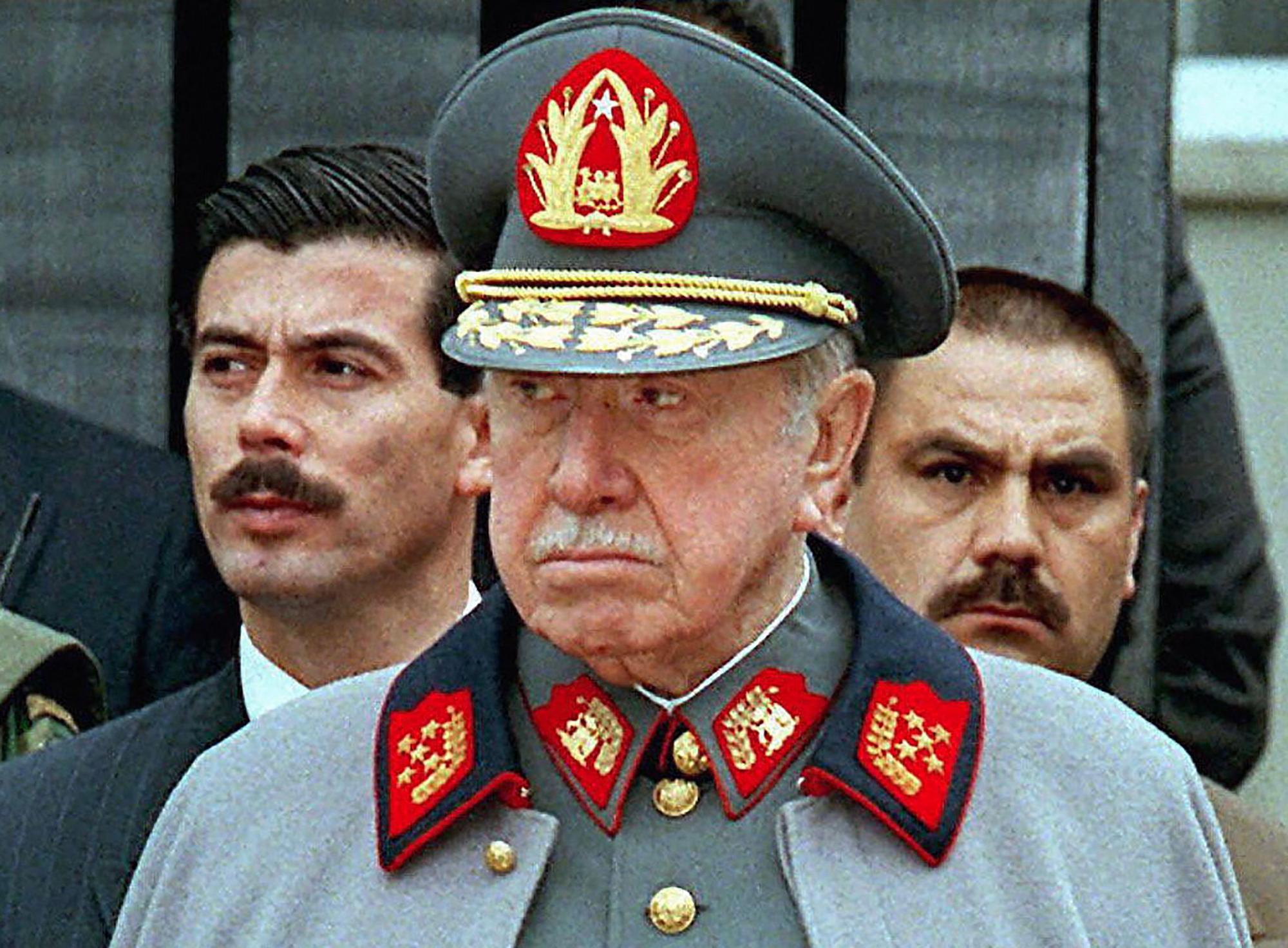 (FILES) Picture of Chile's former dictator Augusto Pinochet taken on September 11, 1997. Augusto Pinochet suspended democracy using military force to overthrow a popularly-elected president and rule Chile with an iron grip that saw thousands of his subjects tortured and killed. Yet, 50 years after he grabbed power on September 11, 1973, and despite his brutal legacy, the general continues to inspire admiration rather than condemnation among many in a country that remains deeply suspicious of the political left. (Photo by Cris BOURONCLE / AFP)