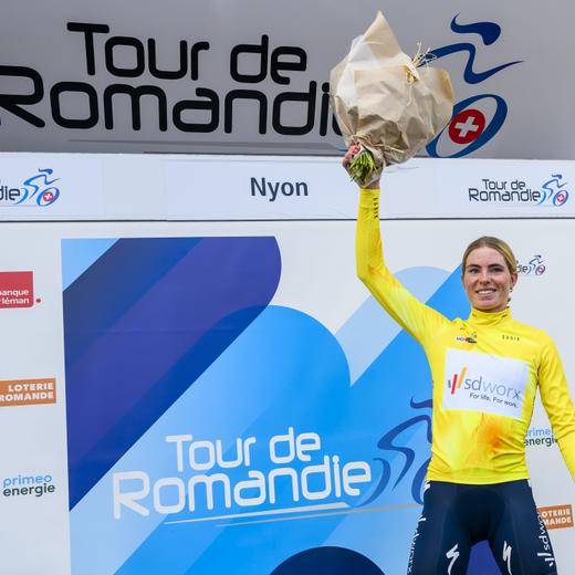 The overall winner Demi Vollering from Netherlands of team SD Worx celebrates on the podium during the third and last stage, a 131,9 km race between Vernier and Nyon at the women's Tour de Romandie Feminin UCI World Tour cycling race in Nyon, Switzerland, Sunday, September 17, 2023. (KEYSTONE/Jean-Christophe Bott)