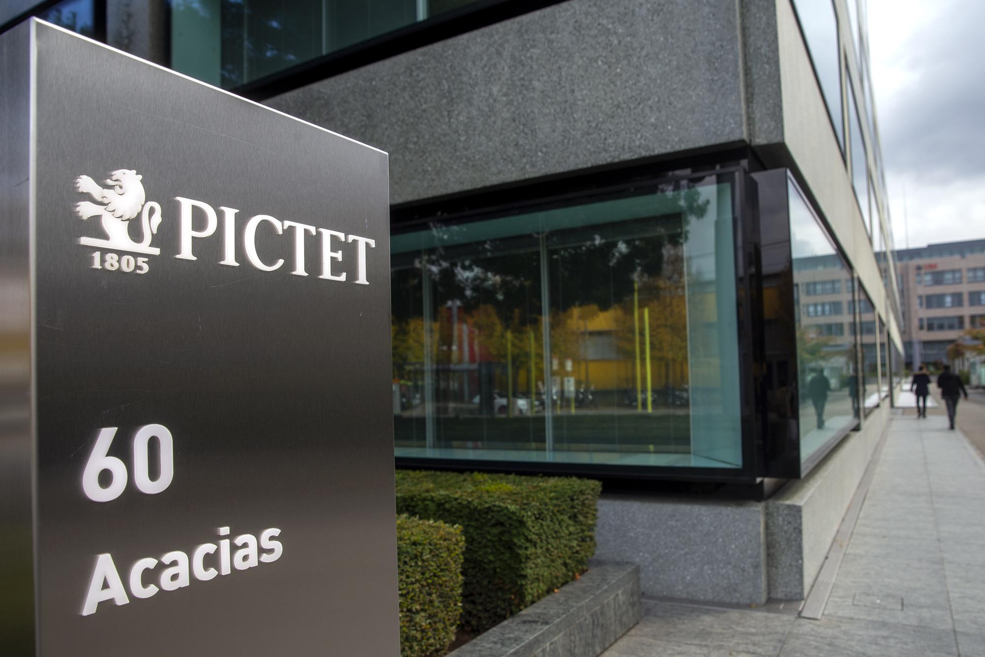 The headquarters building and logo of the private bank Pictet is pictured, in Geneva, Switzerland, Wednesday, October 14, 2020. Pictet & Cie, founded in 1805 at Geneva, is a Swiss bank, and it is specialized on independent asset managemen. (KEYSTONE/Salvatore Di Nolfi)