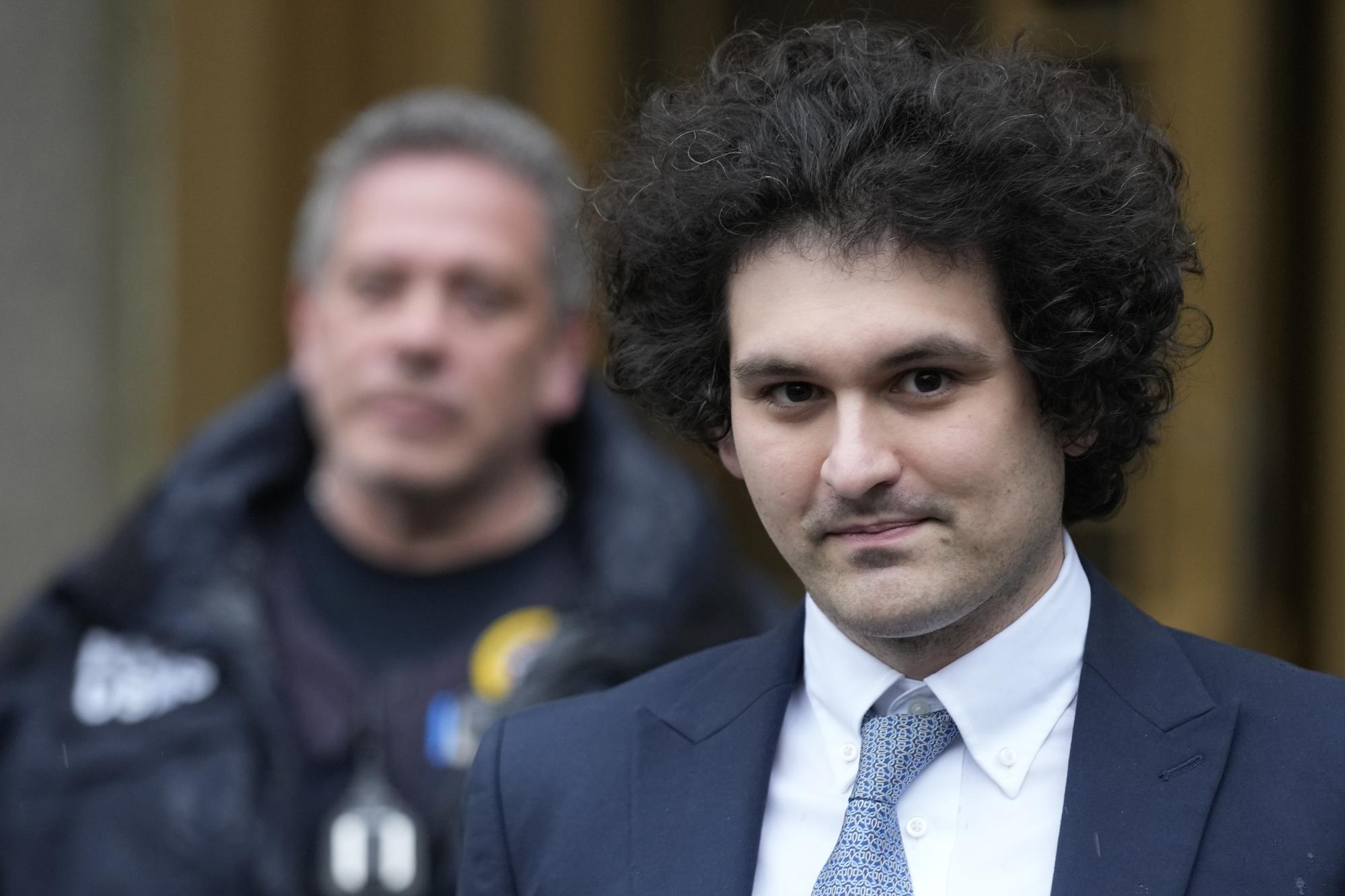 File - Sam Bankman-Fried leaves Manhattan federal court in New York on Feb. 16, 2023. The fraud trial of Bankman-Fried, the founder of failed cryptocurrency brokerage FTX, begins Tuesday with jury selection. (AP Photo/Seth Wenig, File)  Samuel Bankman-Fried