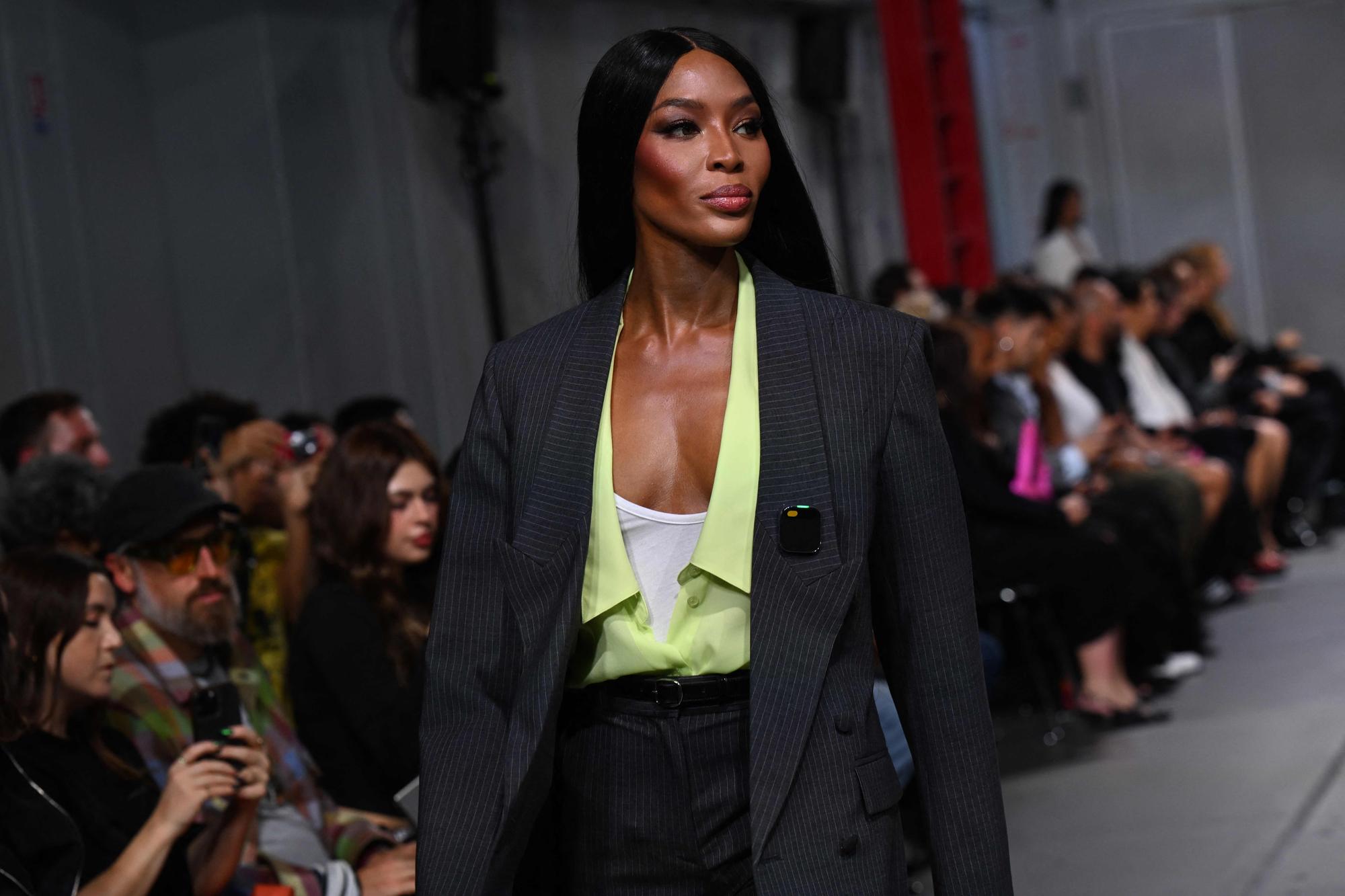 British model Naomi Campbell presents a creation for Coperni during the Paris Fashion Week Womenswear Spring/Summer 2024 in Paris on September 29, 2023. (Photo by Miguel MEDINA / AFP)