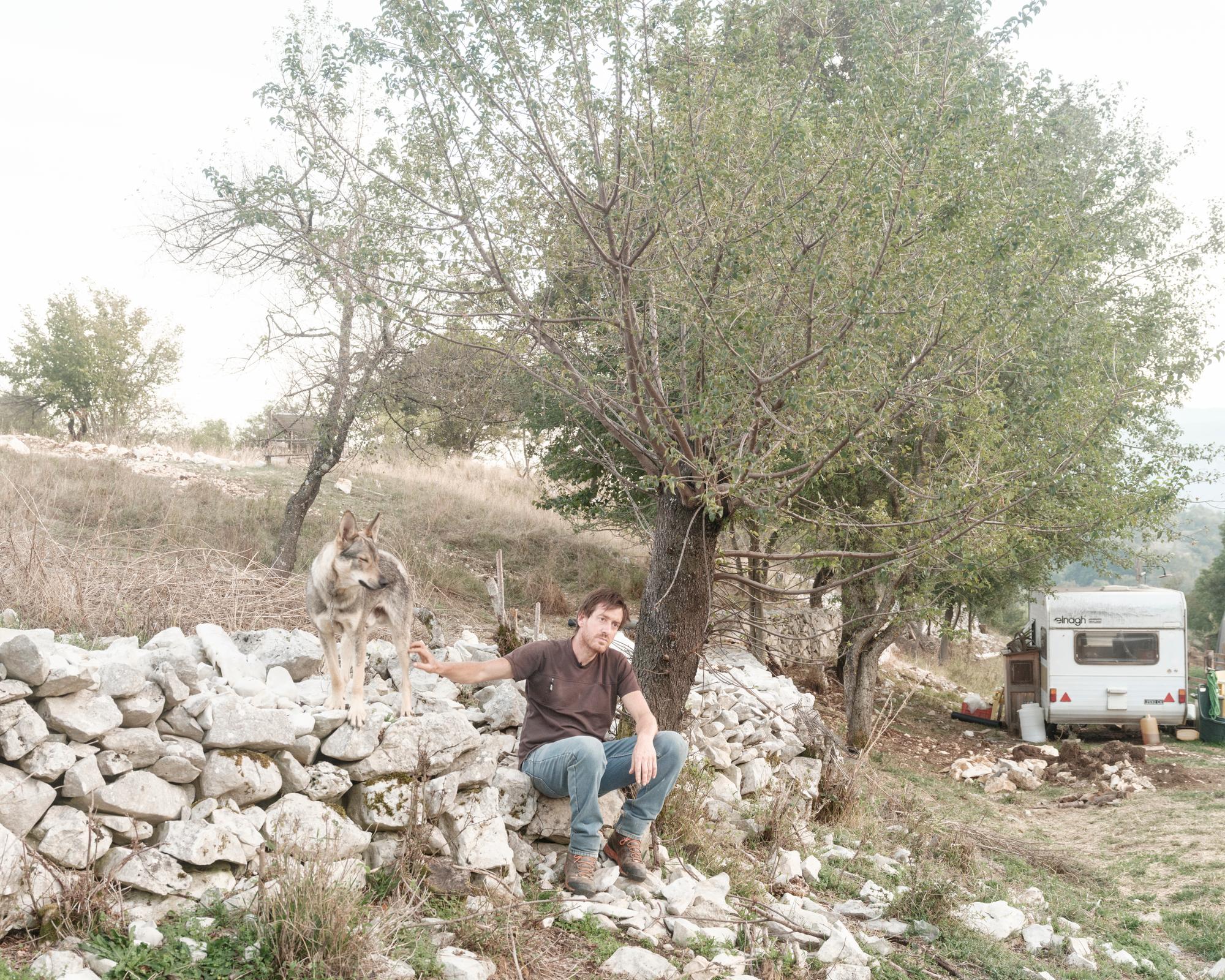 ITALY. Abruzzo Latium and Molise National Park. October 2023. Pietro D'Annessa breeds goats within the park's territory. This year, despite having 13 guard dogs, Maremmano-Abruzzese shepherds, and two lead dogs, Abruzzese wolfhounds, he has suffered between four and five wolf attacks without any losses.
