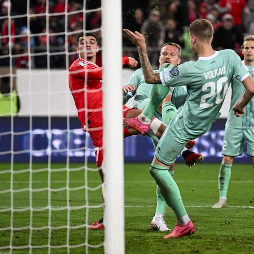 Switzerland's forward #07 Zeki Amdouni (L) scores his team's third goal during the UEFA Euro 2024 football tournament Group I qualifier match between Switzerland and Belarus at Kybunpark stadium in St. Gallen, on October 15, 2023. (Photo by Fabrice COFFRINI / AFP)