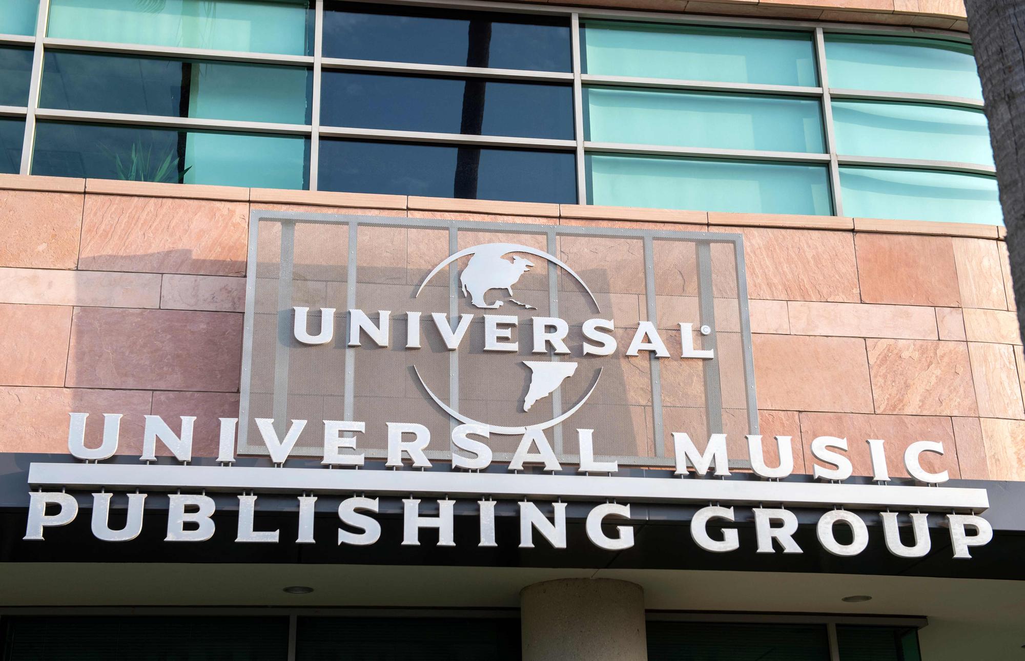 (FILES) A view of the Universal Music Group (UMG) headquarters is seen on February 9, 2021 in Santa Monica, California. Universal and other music publishers have sued artificial intelligence company Anthropic in a US court for using copyrighted lyrics to train its AI systems and in generating answers to user queries. The lawsuit, filed in a Tennessee federal court on October 18, 2023, follows other such cases in which creators have taken on AI companies for using their material. (Photo by VALERIE MACON / AFP)