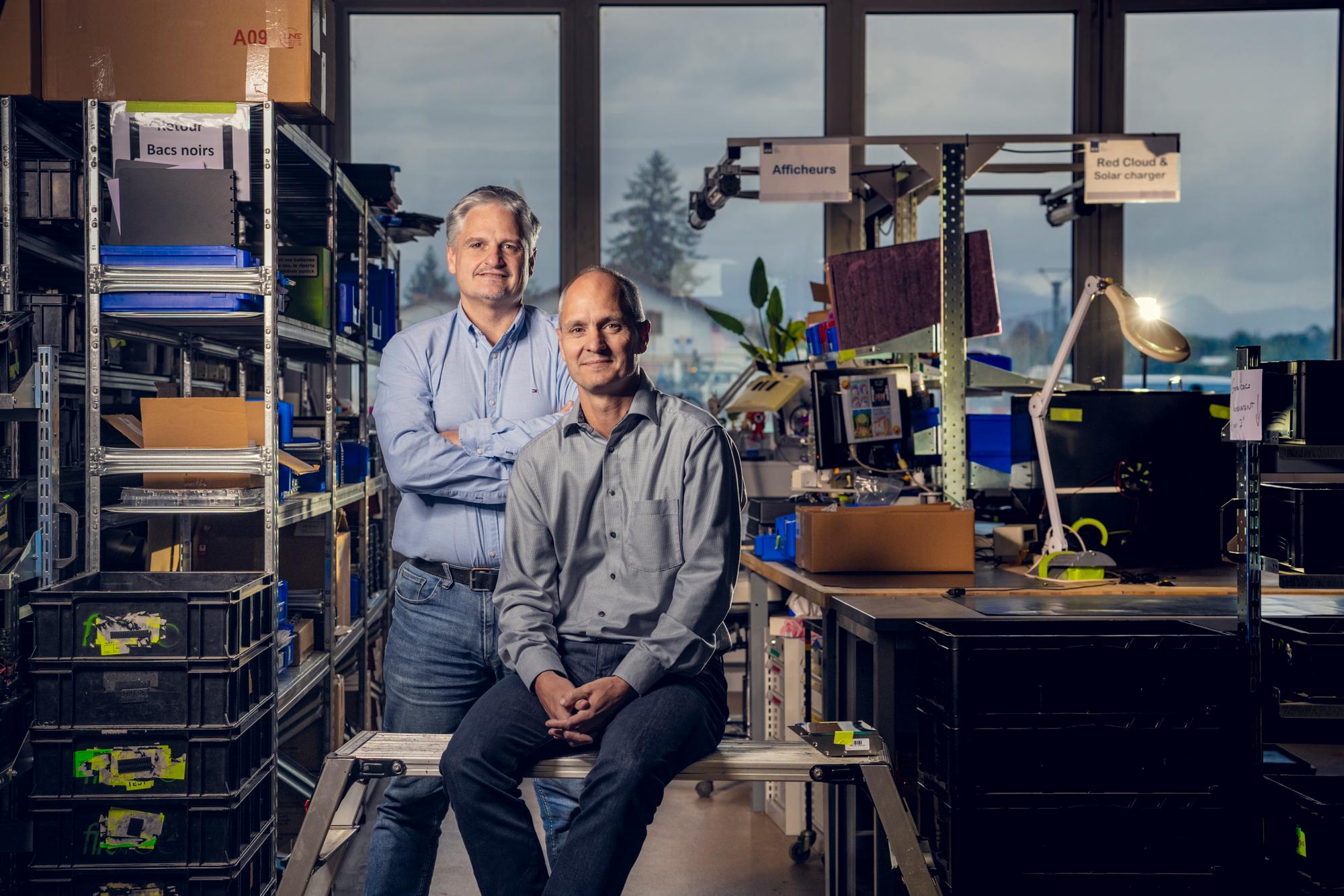 François et Philippe Menoud directeurs de IEM posent dans l'atelier des locaux de Genève à Plan-les-Ouates, à Genève, le 20 octobre 2023.
