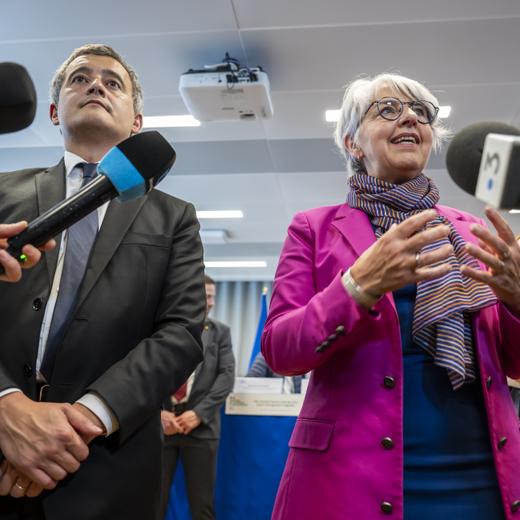 Gerald Darmanin, left, French Interior Minister and Elisabeth Baume-Schneider, right, Swiss Federal Councillor at the Department of Justice and Police, speak to the press, during the occasion that Switzerland and France strengthen their cooperation in the fight against irregular migration and agree on an action plan in this regard with the signing of a joint declaration to stem irregular migration, at the Swiss-French border of Moillesulaz near Geneva, Switzerland, Friday, October 27, 2023. (KEYSTONE/Martial Trezzini)