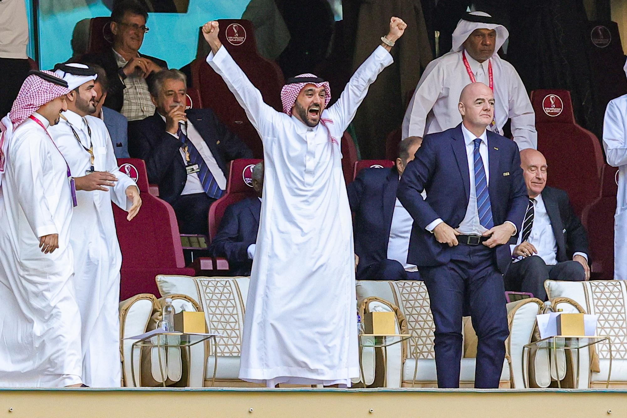 Saudi Crown Prince Mohammed bin Salman Al Saud celebrates the Saudi Arabia teams winning the match during the FIFA World Cup 2022, Group C football match between Argentina and Saudi Arabia on November 22, 2022 at Lusail Stadium in Al Daayen, Qatar - Photo Nigel Keene / ProSportsImages / DPPI (Photo by Nigel Keene / ProSportsImages / DPPI via AFP)