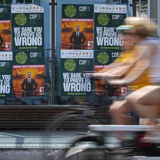 FILE - Posters depicting Sultan al-Jaber, the COP28 President, are displayed at a bus stop outside the United Nations Climate Change Conference in Bonn, Germany, June 8, 2023. Because the upcoming summit, COP28, is in Dubai, the United Arab Emirates got to choose the president, picking the CEO of its national oil company, al-Jaber. (AP Photo/Martin Meissner, File)
