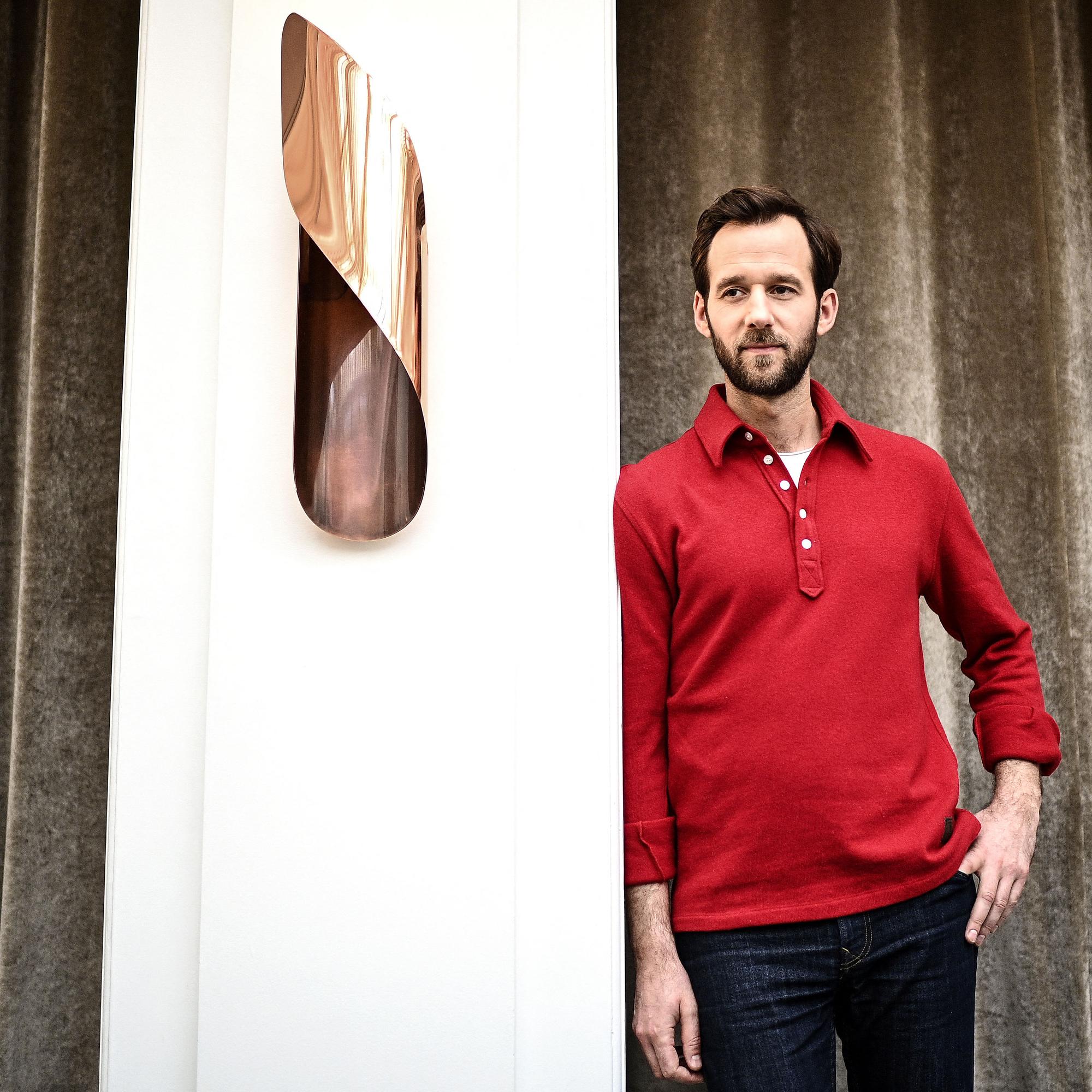 French actor Benjamin Lavernhe, a member of the permanent troupe of the Comedie Francaise state theatre, poses during a photo session in Paris on December 15, 2020. (Photo by Christophe ARCHAMBAULT / AFP)