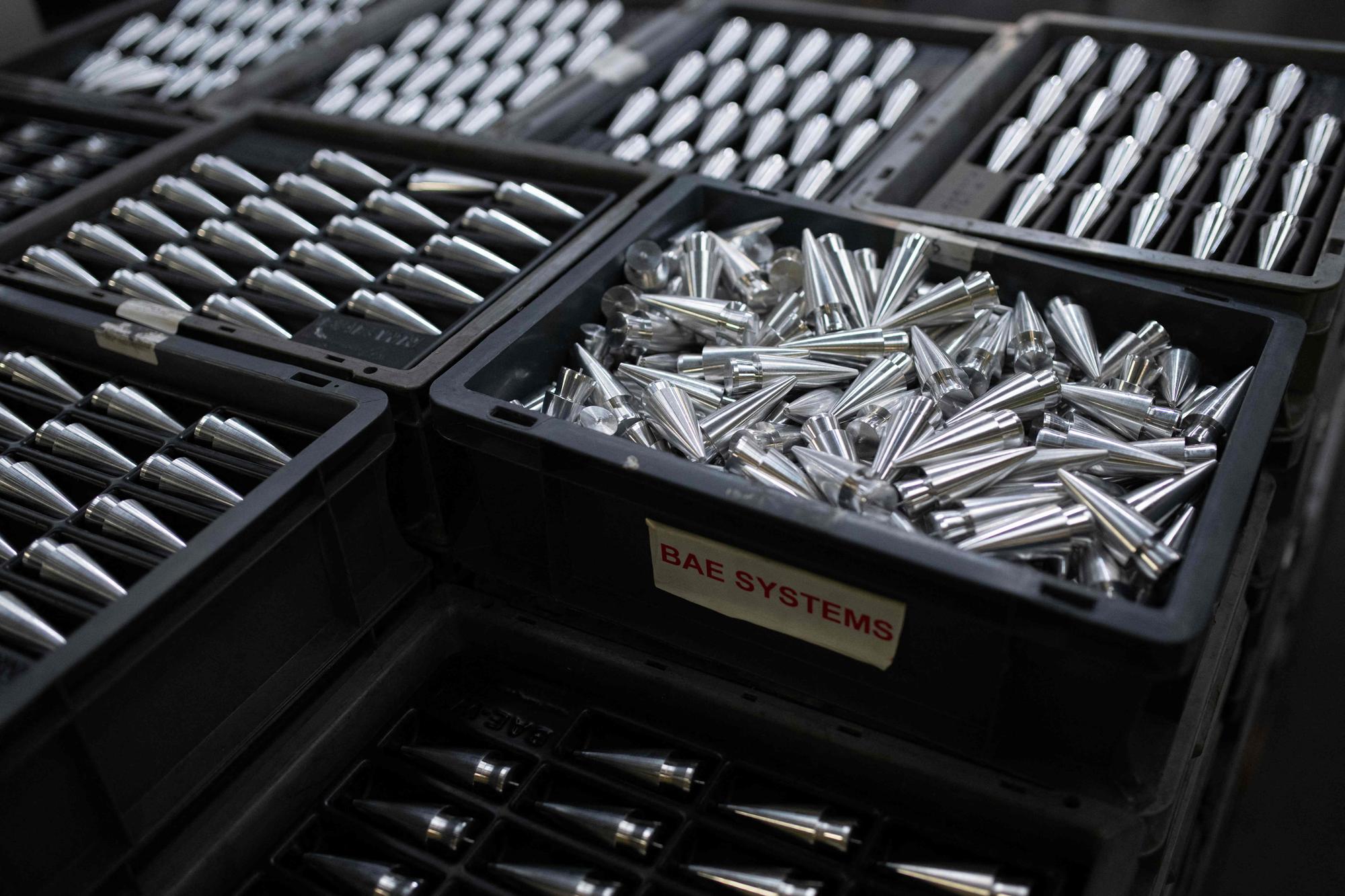 (FILES) Projectiles for 30mm caliber ammunition are produced at the BAE Systems factory in Washington, near Newcastle upon Tyne in north-east England on November 8, 2023. A munitions factory of the British defense giant BAE Systems in the north of England is running at full capacity, boosted by the war in Ukraine and an increasingly gloomy geopolitical outlook. (Photo by Oli SCARFF / AFP)