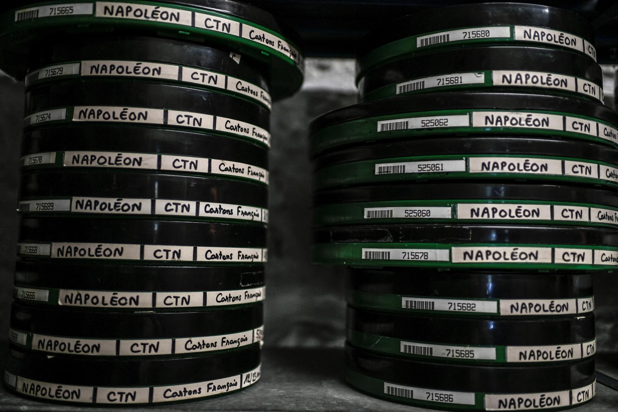 This photograph taken on May 6, 2021, shows the different film rolls of the movie Napoleon (1927) by French director Abel Gance used for the reconstruction of its Apollo version in the buildings of the Cinematheque Francaise at the Fort-de-Saint-Cyr in Montigny-le-Bretonneux, near Paris. (Photo by STEPHANE DE SAKUTIN / AFP)
