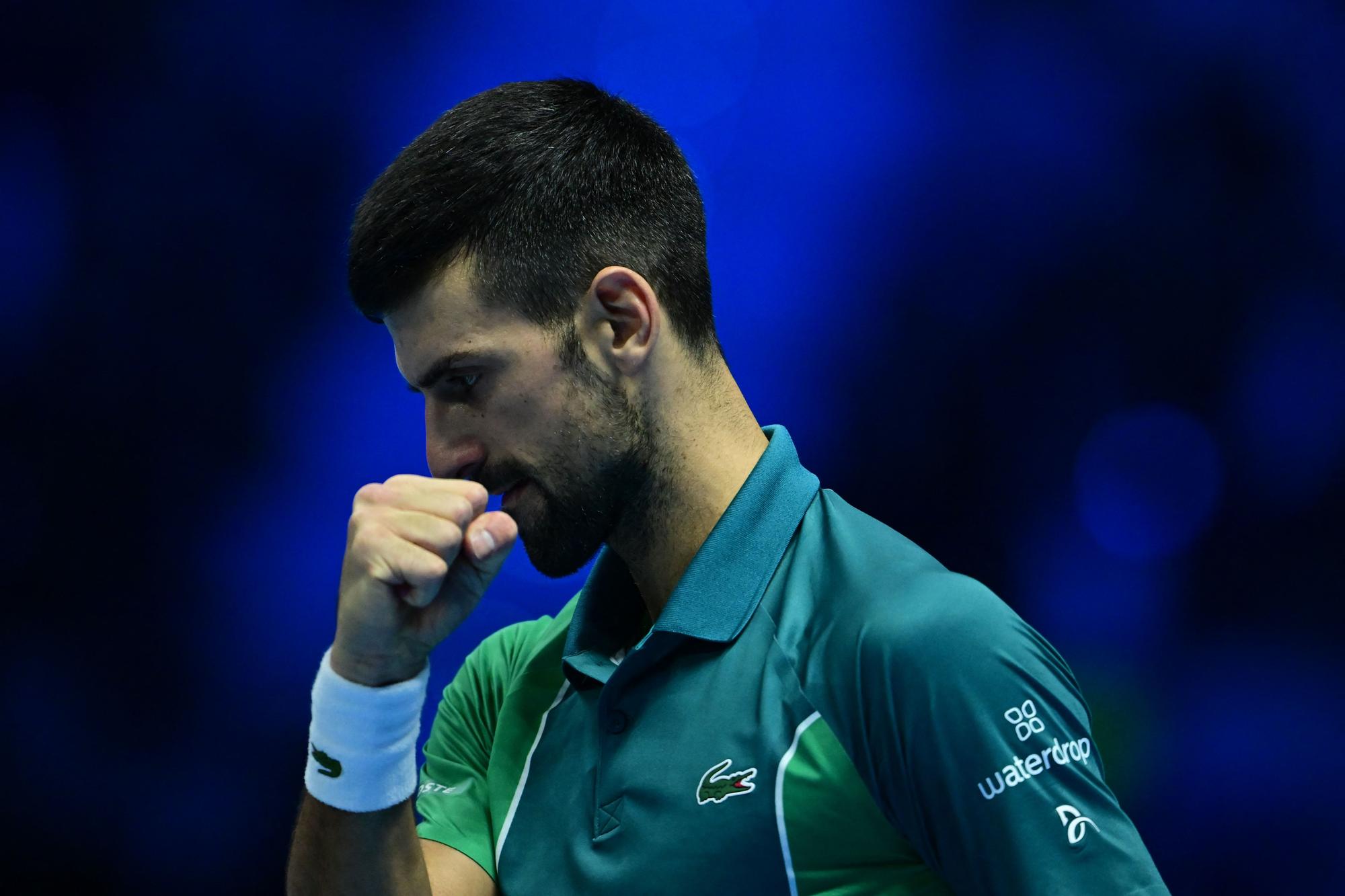 Serbia's Novak Djokovic reacts during the final match against Italy's Jannik Sinner at the ATP Finals tennis tournament in Turin on November 19, 2023. (Photo by Tiziana FABI / AFP)