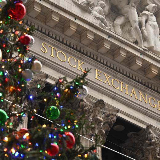 A Christmas tree stands in front of the New York Stock Exchange (NYSE) in New York on December 1, 2023. (Photo by ANGELA WEISS / AFP)