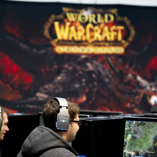 Youths play the online computer game "World of Warcraft" at the CeBIT, the world's biggest IT fair, on March 3, 2011 in Hanover, central Germany. More than 4,200 tech firms from 70 countries are expected to attend this year's CeBIT, with many of the big names that stayed away during the global financial crisis returning to Germany. The fair is running until March 5, 2011. AFP PHOTO / JOHANNES EISELE (Photo by JOHANNES EISELE / AFP)
