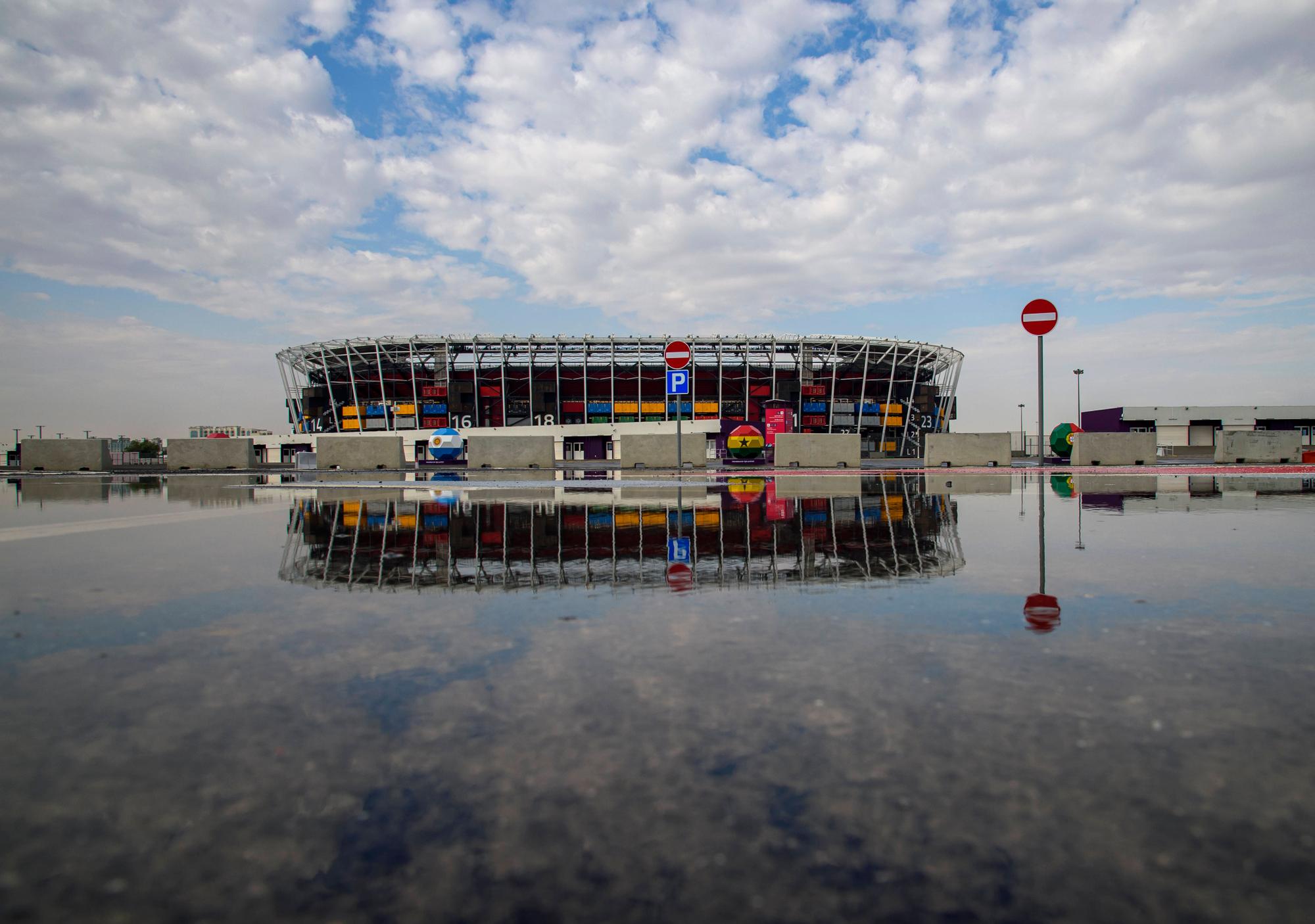 Daily Life In Doha After The 2022 World Cup Qatar Stadium 974 reflected in rainwater in Doha,Qatar on 14 January 2023.The worlds first transportable football ground, made with 974 recycled shipping containers, hosted seven matches during the Fifa World Cup. DOHA Qatar PUBLICATIONxNOTxINxFRA Copyright: xNoushadxThekkayilx originalFilename: varittyakkal-stadium9230114_npi9T.jpg