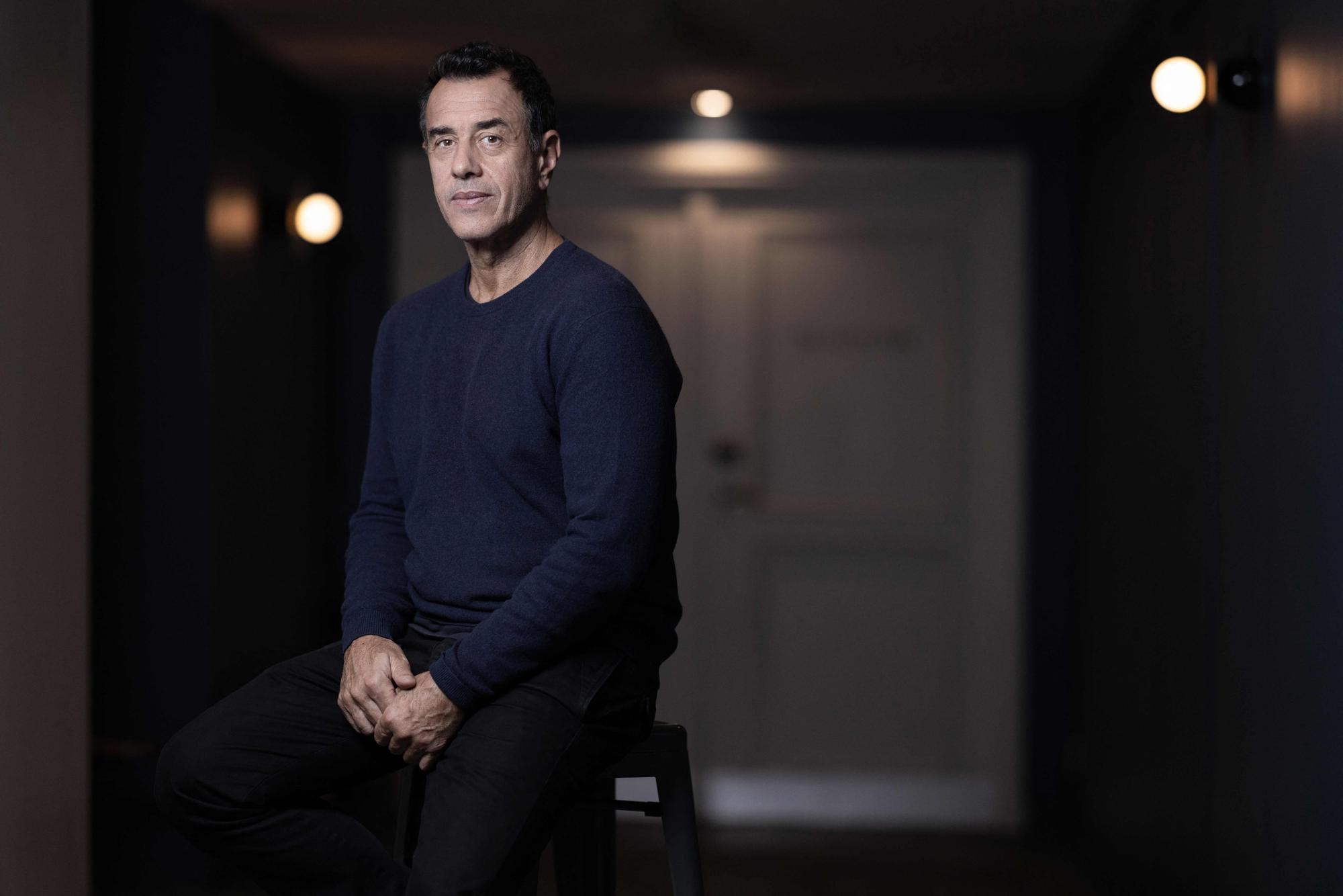 (FILES) Italian filmmaker Matteo Garrone poses during a photo session in Paris on December 13, 2023. In the cinema, they are heroes: far from the political jousting, the figure of the migrant is increasingly used in films, as shown by the release on December 27, 2023 of "Moi capitaine", by Italian director Matteo Garrone. (Photo by JOEL SAGET / AFP)