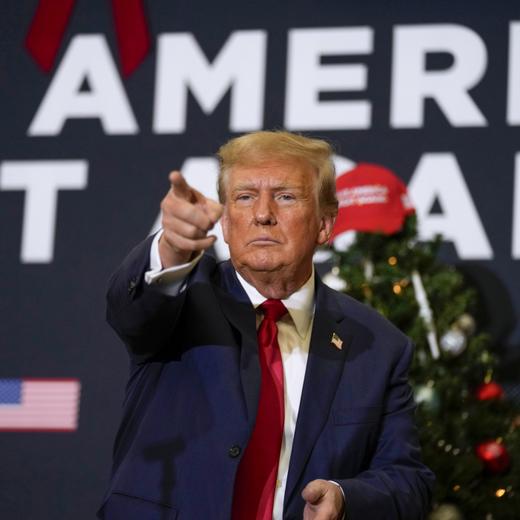 FILE - Former President Donald Trump points to supporters during rally Dec. 19, 2023, in Waterloo, Iowa. (AP Photo/Charlie Neibergall, File)