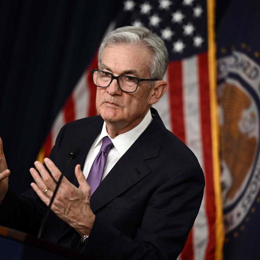 (FILES) US Federal Reserve Chairman Jerome Powell holds a press conference at the end of Monetary Policy Committee meeting in Washington, DC, on December 13, 2023. US Federal Reserve officials expect interest rates will need to remain high "for some time" to tackle stubborn inflation, according to minutes of the most recent rate decision published on January 3, 2024. (Photo by Brendan SMIALOWSKI / AFP)