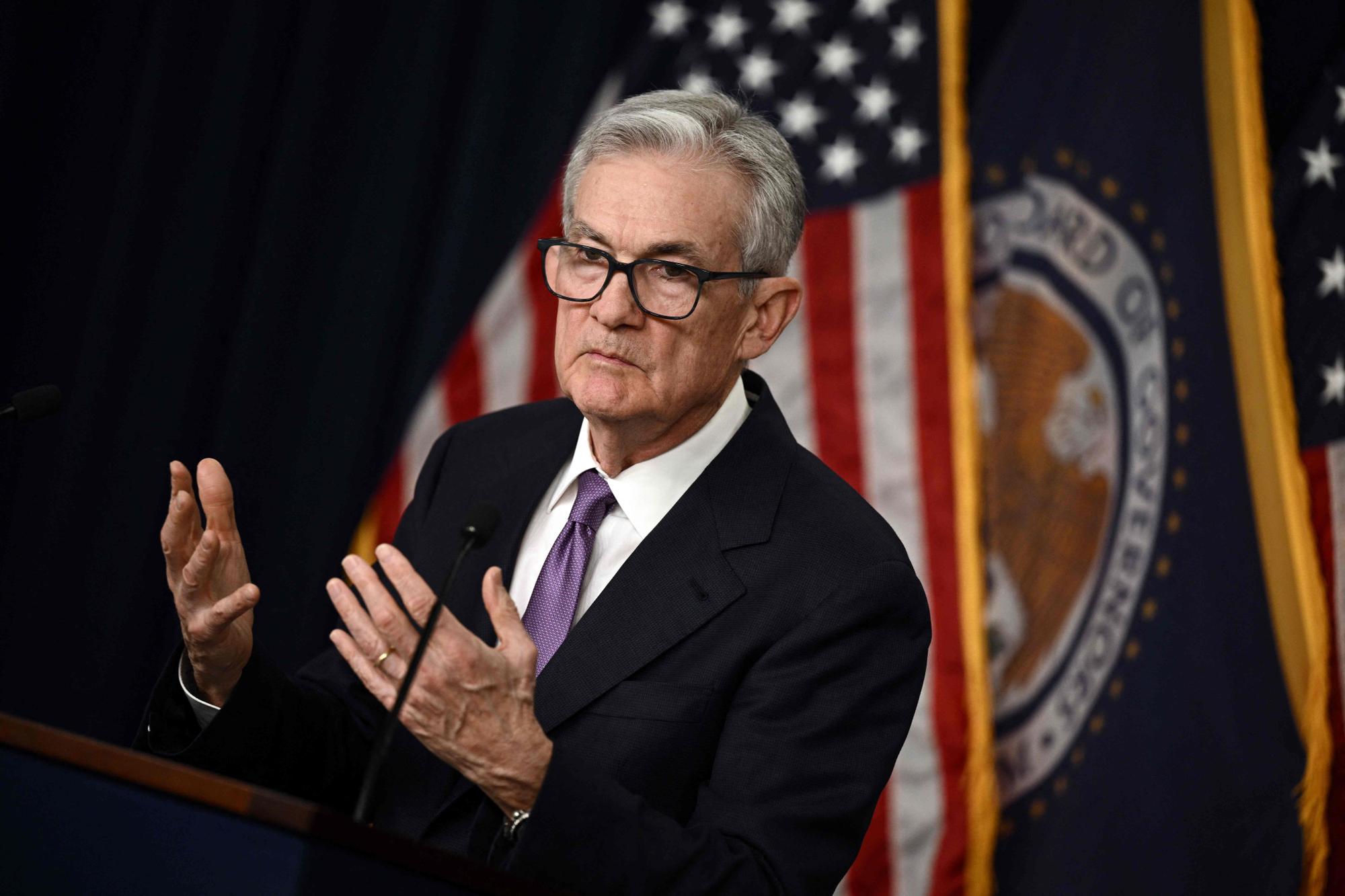 (FILES) US Federal Reserve Chairman Jerome Powell holds a press conference at the end of Monetary Policy Committee meeting in Washington, DC, on December 13, 2023. US Federal Reserve officials expect interest rates will need to remain high "for some time" to tackle stubborn inflation, according to minutes of the most recent rate decision published on January 3, 2024. (Photo by Brendan SMIALOWSKI / AFP)