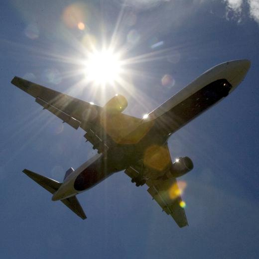 FILE - A Delta Airlines plane flies into Portland International Airport in Portland, Ore., Monday, July 20, 2009. A former Delta Airlines pilot accused of threatening to shoot a commercial airline captain if they diverted their flight to give a passenger medical attention is will make his first court appearance in Utah, Thursday, Jan. 4, 2024. (AP Photo/Don Ryan, File)
