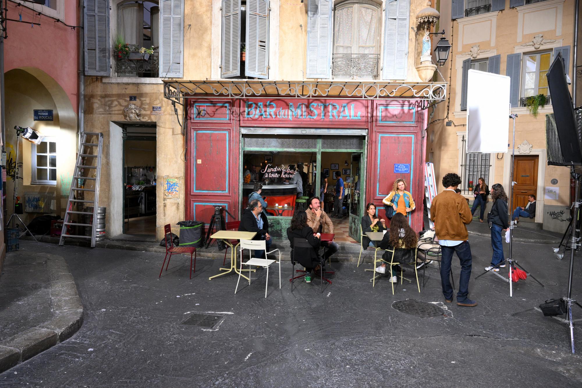 Cast members have a break on the set during the last day of shooting of the French television series "Plus belle la vie" at the Studios de la Belle de Mai on September 28, 2022, in Marseille, soutehrn France. "Plus belle la vie" is broadcasted since August 2004 and its ultimate episode will be aired on November 18, 2022. (Photo by Nicolas TUCAT / AFP)