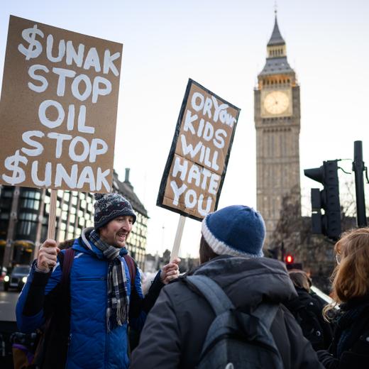 LONDON, ENGLAND - JANUARY 22: Just Stop Oil campaigners gather to protest against the Offshore Licensing Bill in Parliament Square on January 22, 2024 in London, England. Environmental campaigners and some Northern Mayors are calling on the Government to drop the parliamentary Bill that aims to encourage more licence applications for extracting oil and gas in the North Sea. (Photo by Leon Neal/Getty Images)