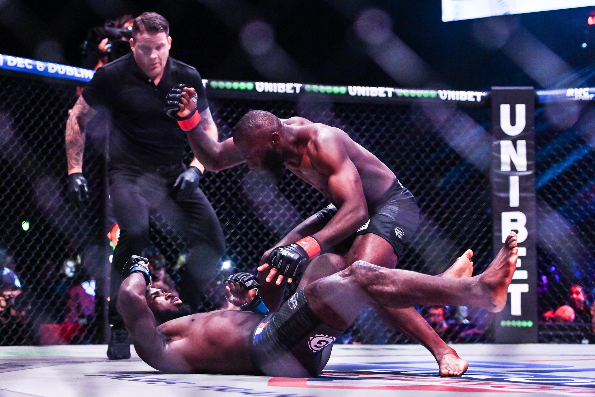 Cedric DOUMBE (red gloves) and Jordan ZEBO (blue gloves) during the Professional Fighters League - MMA at Zenith Paris on September 30, 2023 in Paris, France. (Photo by Anthony Dibon/Icon Sport via Getty Images)