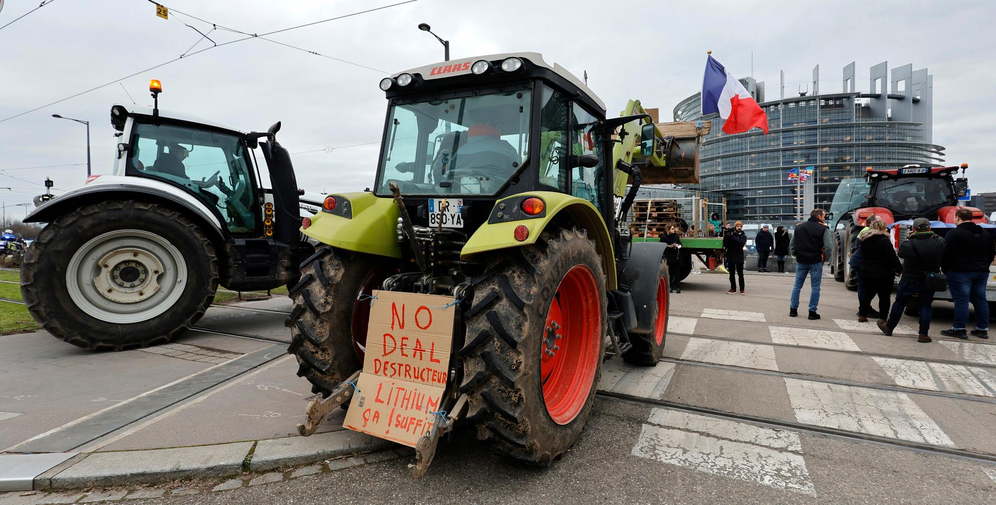 epa11130702 Farmers with their tractors block the entrance of the European Parliament during a protest action in Strasbourg, France, 06 February 2024. Farmers in France continue to protest against what they say are harmful European agricultural policies, echoing demonstrations in other parts of Europe, including Germany, Belgium, Italy, and Spain. EPA/RONALD WITTEK