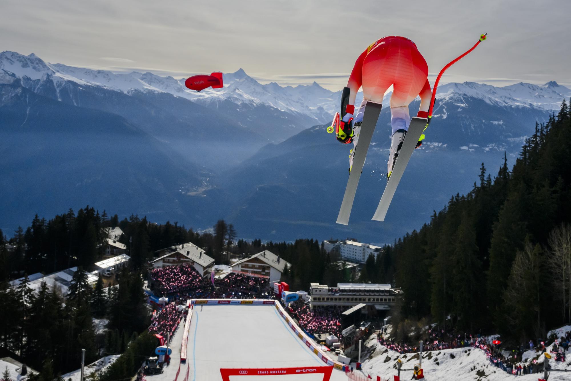 epa11163065 Lara Gut-Behrami of Switzerland is airborne during the women's Super G race at the Alpine Skiing FIS Ski World Cup, in Crans Montana, Switzerland, 18 February 2024. EPA/JEAN-CHRISTOPHE BOTT