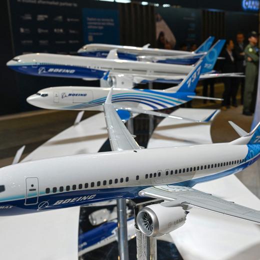 Miniature models of Boeing aircraft including the 737 Max (front) are displayed at the Singapore Airshow in Singapore on February 21, 2024. (Photo by Roslan RAHMAN / AFP)