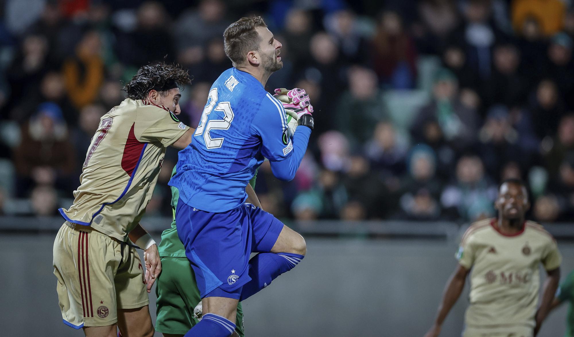 Servette's goalkeeper saves the ball during the Europa Conference League play off second leg soccer match between Ludogorets and Servette at Huvepharma Arena in Razgrad, Bulgaria, Thursday, Feb. 22, 2024. (AP Photo/Tony Uzunov)