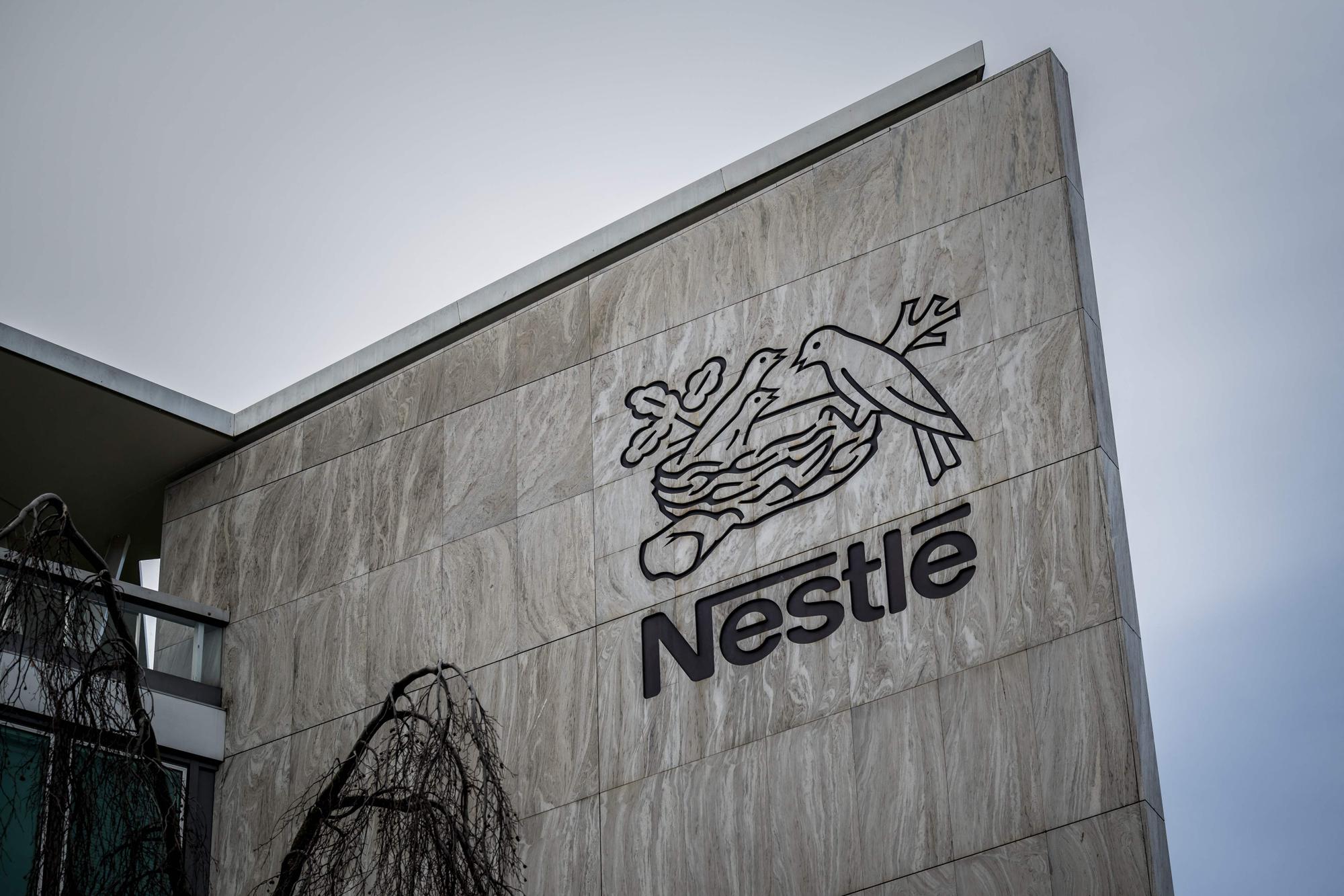 A picture taken on February 21, 2024 show the logo of Swiss food giant Nestle on the company's headquarters in Vevey, western Switzerland. Food giant Nestle said, on February 22, 2024, net profits last year rose 20.9 percent to 11.2 billion Swiss francs ($12.7 billion) after increasing prices of its products to offset growing costs. (Photo by Fabrice COFFRINI / AFP)