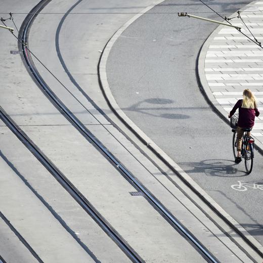 Cyclists pass trams lines along Klarabergsgatan in Stockholm, Sweden, on Thursday, Aug. 18, 2022. Swedens government forecast the economic expansion to stall next year as high inflation and rising rates weigh on household consumption. Photographer: Mikael Sjoberg/Bloomberg via Getty Images
