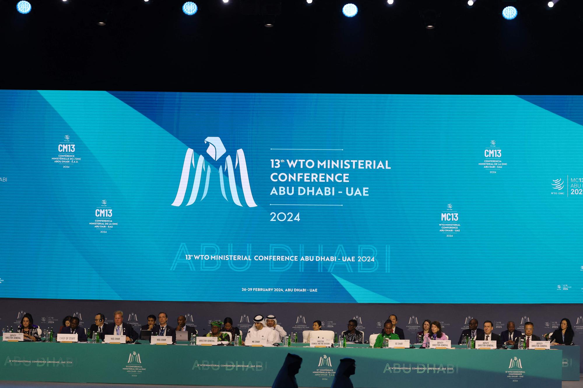 Delegates attend the 13th World Trade Organisation Ministerial Conference in Abu Dhabi of February 26, 2025. The world's trade ministers gathered in the UAE on February 26 for a high-level WTO meeting with no clear prospects for breakthroughs, amid geopolitical tensions and disagreements. (Photo by Giuseppe CACACE / AFP)