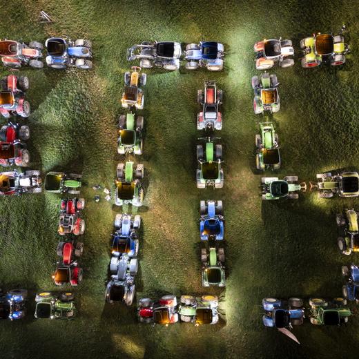 epa11189573 Farmers organize themselves to form a giant 'SOS' distress signal with their tractors as coordinated stunt replicated in various locations across the country, in a field near the village Sales (Gruyeres) in the canton of Fribourg, Switzerland, 29 February 2024. Farmer are protesting against their work conditions and here specifically the price of milk, echoing numerous protests across Europe in the recents weeks. EPA/ANTHONY ANEX