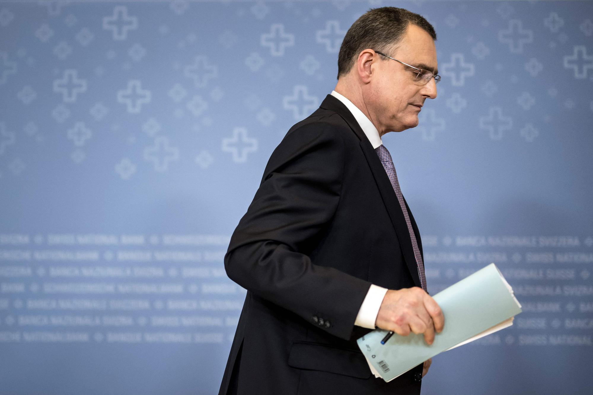 Chairman of the Swiss National Bank (SNB BNS) Thomas Jordan leaves a press conference in Zurich on March 1, 2024, after the surprise announcement that he will step down in September 2024 after 12 years in charge. (Photo by Fabrice COFFRINI / AFP)