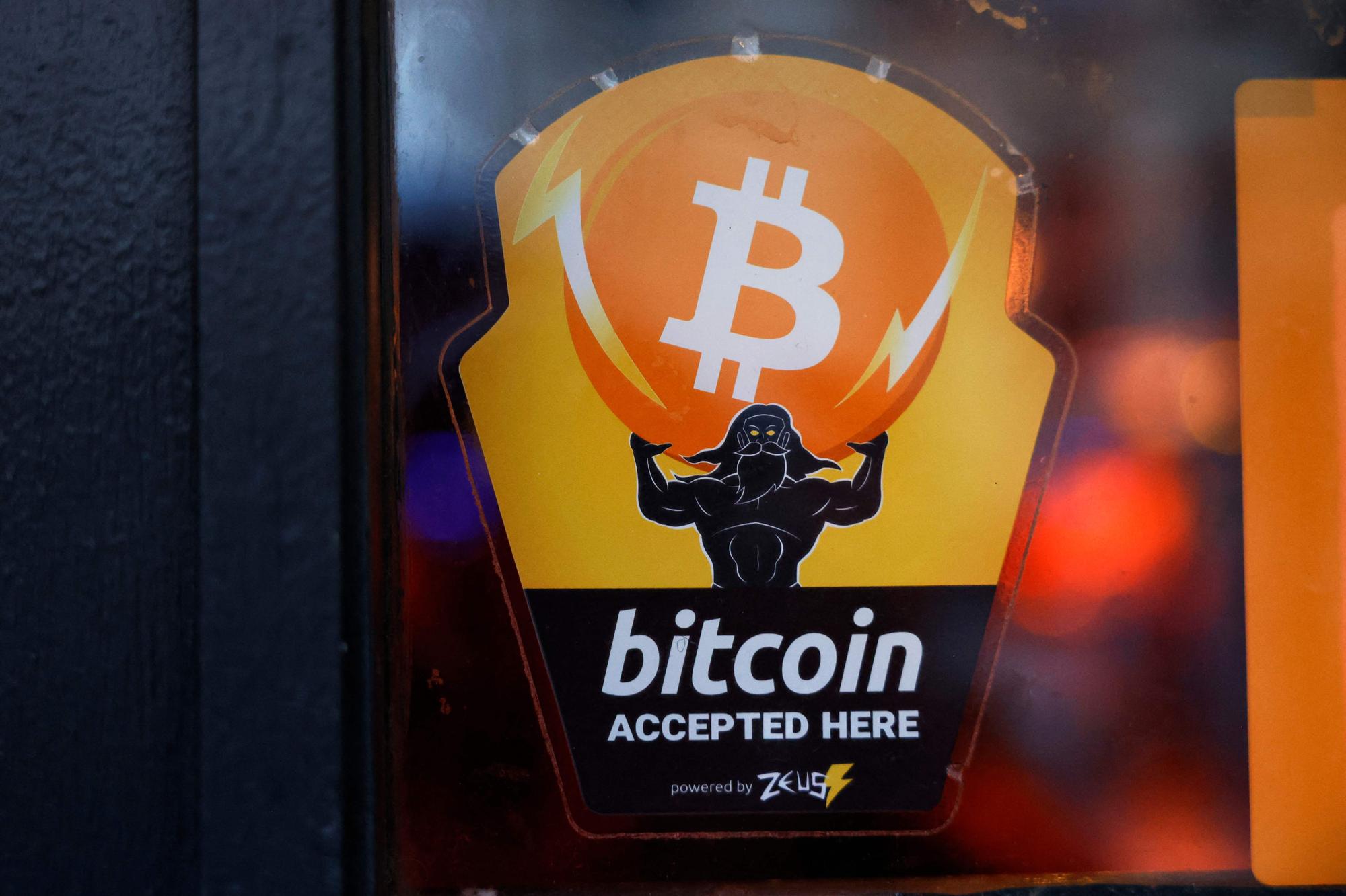 NEW YORK, NEW YORK - FEBRUARY 29: A Bitcoin Accepted Here sticker is seen at Pubkey Bar on February 29, 2024 in New York City. The price of bitcoin reached $63,000 on Wednesday for the first time since the peak of the last bull market in November 2021, which coincided with the U.S. traded spot ETFs. Michael M. Santiago/Getty Images/AFP (Photo by Michael M. Santiago / GETTY IMAGES NORTH AMERICA / Getty Images via AFP)