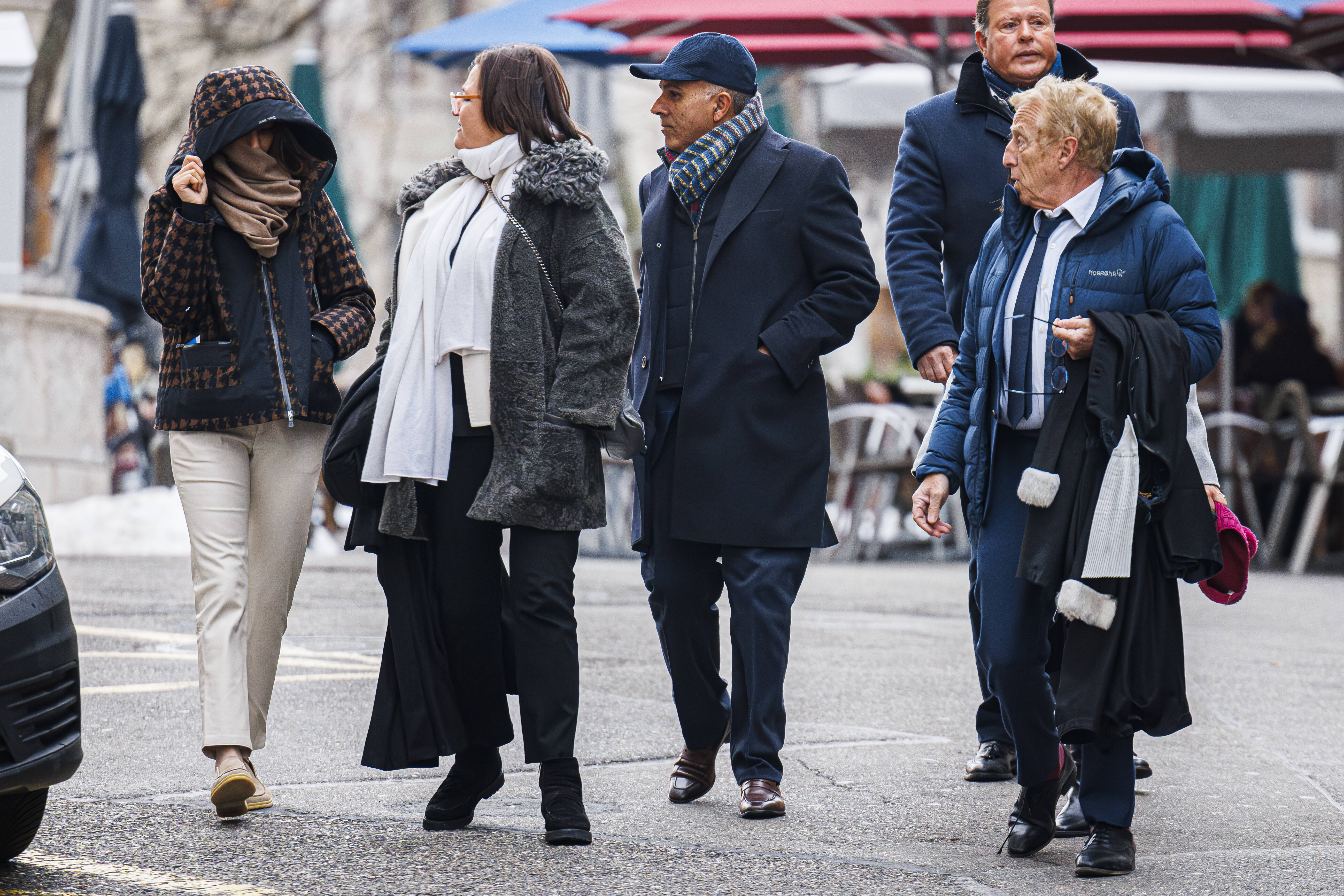 Yael Hayat (left) and Robert Assael (right) lawyers of the accused, arrive at the court house with their clients Ajay Hinduja (2nd right) and his wife Namrata (2nd left) of Indian billionaire family Hinduja charged with human traficking and usury, on the opening day of their trial in Geneva, Switzerland, Monday, January 15th, 2024. (KEYSTONE/Valentin Flauraud)